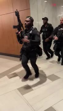 Police Seen Running Through the Wash. Hilton Where the W.H. Correspondents’ Dinner Is Being Held After Reports of Shots Fired