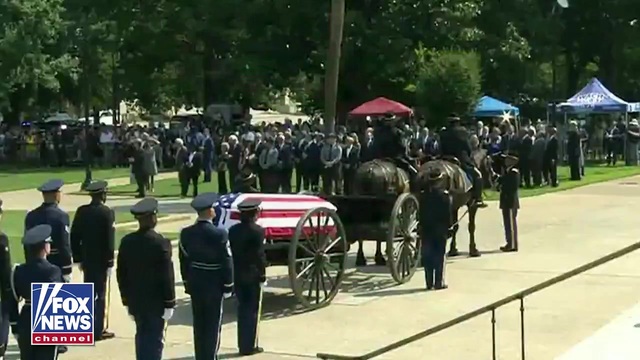 An F-16 Flyover Pays Tribute to the Late Sen. Lindsey Graham as Funeral Procession Continues to First Baptist Church of Columbia