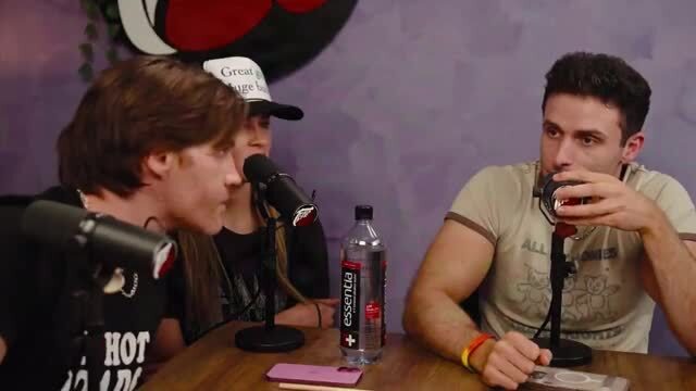 Hasan Piker, Sitting at a Table with an LGBTQ+ Flag Says His Favorite Flag Is Hezbollah